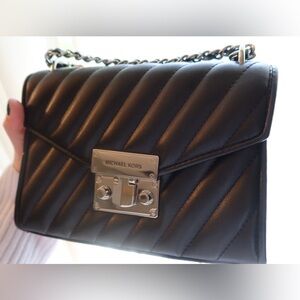Black Michael Kors purse with silver hardware